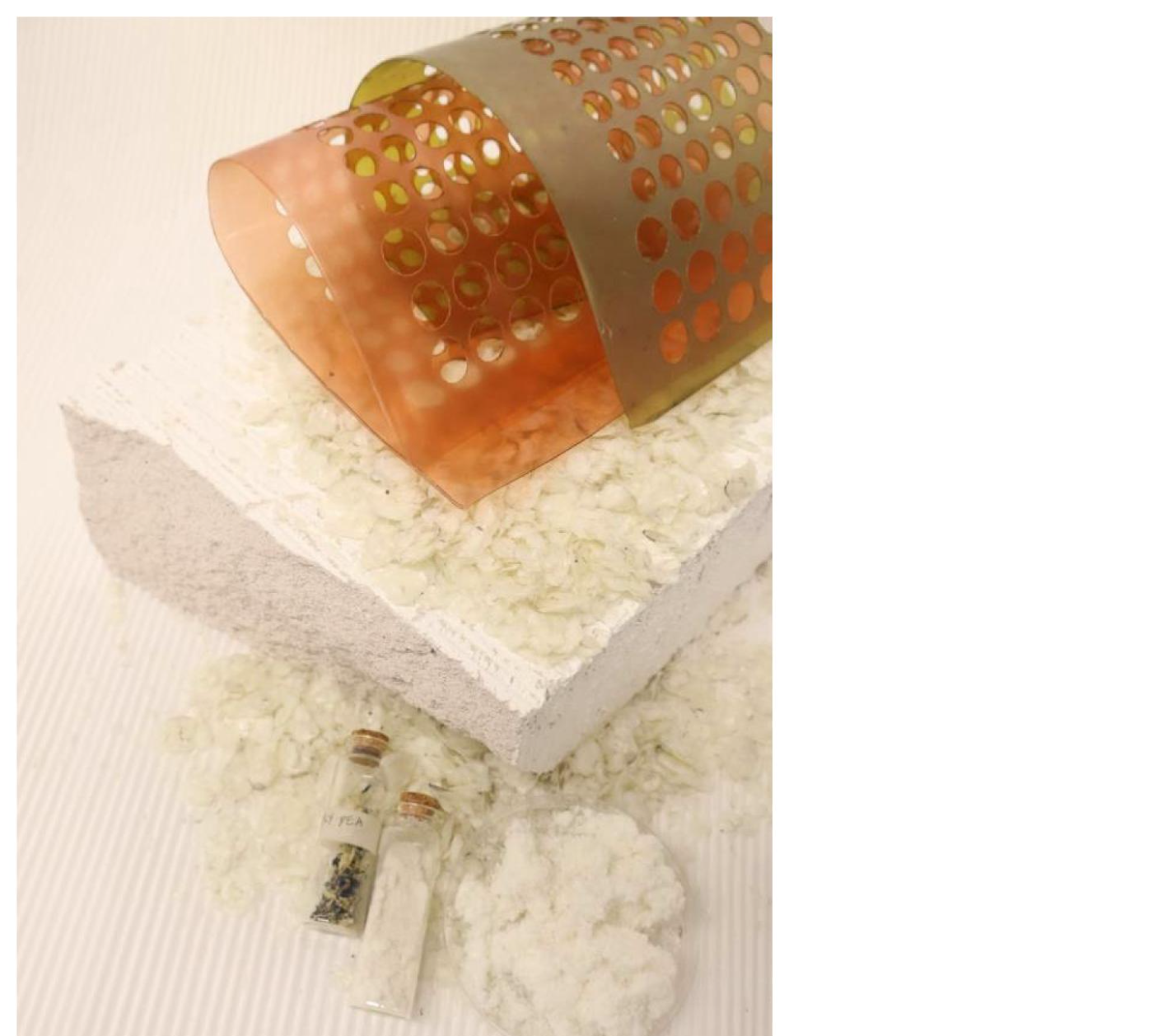 Composite sheets rolled into cylinders
